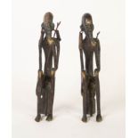 PAIR OF AFRICAN BRONZE FIGURES OF SEATED ELDERS, each modelled holding a simple staff with V shape