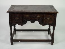 NINETEENTH CENTURY CARVED OAK WRITING OR DRESSING TABLE IN THE EIGHTEENTH CENTURY STYLE, the moulded