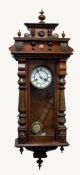 VICTORIAN WALNUT CASED VIENNA STYLE WALL CLOCK, the 5? two part Roman dial, powered by a spring