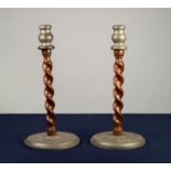 PAIR OF OAK AND HOMELAND PLANISHED PEWTER TABLE CANDLESTICKS, each of barley twist form with