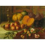 INITIALLED L.T. (MODERN)  OIL PAINTING ON BOARD Still life with melons, peaches, grapes and cut