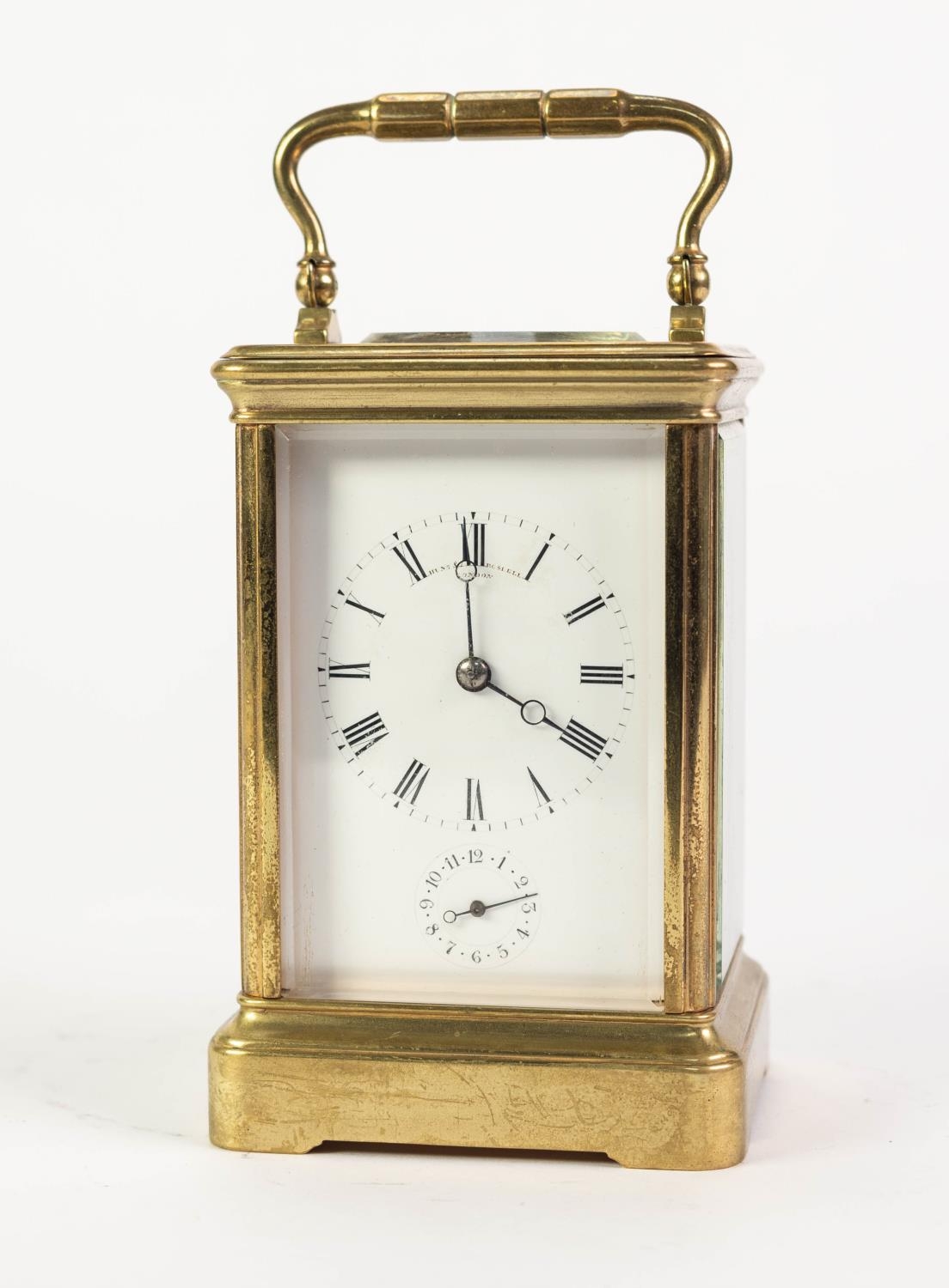 HUNT & ROSKELL, LONDON, LATE NINETEENTH CENTURY GILT BRASS STRIKING CARRIAGE CLOCK WITH ALARM