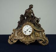 FRENCH LATE NINETEENTH CENTURY AND PARCEL GILT METAL CLOCK with 8 day  movement striking on  a domed