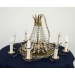 TWENTIETH CENTURY GILT METAL AND CUT GLASS EIGHT BRANCH TENT AND WATERFALL ELECTROLIER, the frame