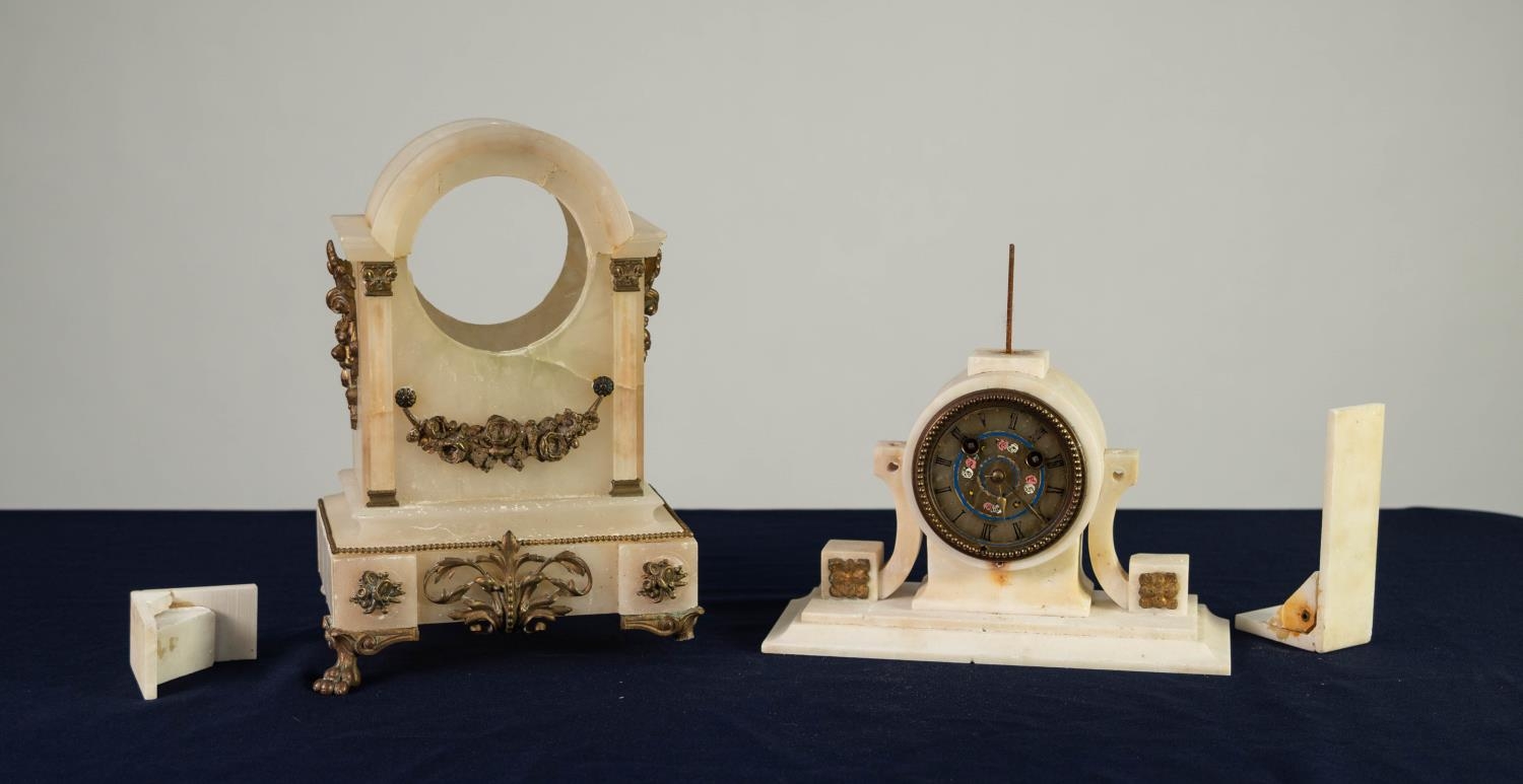 LATE NINETEENTH/ EARLY TWENTIETH CENTURY FRENCH GILT METAL MOUNTED ALABASTER MANTLE CLOCK, the