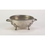 ARGENT PLANISHED PEWTER TWO HANDLED DISH, of steep sided form with loop handles and paw feet,