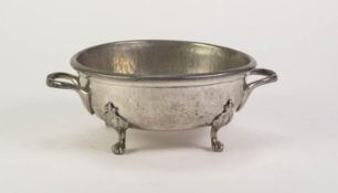 ARGENT PLANISHED PEWTER TWO HANDLED DISH, of steep sided form with loop handles and paw feet,