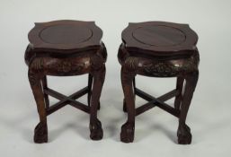 PAIR OF MODERN ORIENTAL CARVED REDWOOD VASE STANDS, each of shaped, square form with floral carved