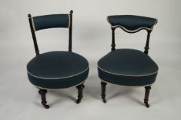 TWO SIMILAR EBONISED AND PARCEL GILT DRAWING ROOM NURSING CHAIR, each with low back, turned and