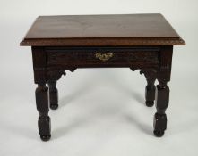 ANTIQUE AND LATER CARVED OAK WRITING TABLE, the heavy oblong top with moulded edge, set above a