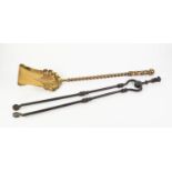 EDWARDIAN BRASS COAL SHOVEL with twisted handle, together with a pair of cast iron fire tongs, (2)