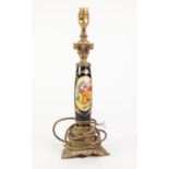 EARLY TWENTIETH CENTURY GILT METAL MOUNTED PORCELAIN TABLE LAMP BASE, with hand painted oval panel