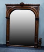IMPRESSIVE EARLY NINETEENTH CENTURY CRAVED MAHOGANY WALL MIRROR, the arched plate housed in a flat