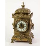 EARLY TWENTIETH CENTURY EMBOSSED BRASS CLOCK BY JAPY FERES, the 4? Arabic dial powered by a drum