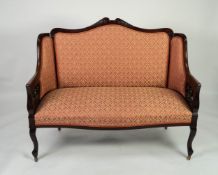 THREE PIECE EDWARDIAN CARVED MAHOGANY PART DRAWING ROOM SUITE, comprising: TWO SEATER SOFA and