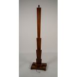 ART DECO FIGURED WALNUT STANDARD LAMP, the flat, fan shaped column, raised on a stepped, oblong