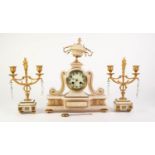 LATE NINETEENTH CENTURY FRENCH GILT METAL MOUNTED WHITE ALABASTER MATCHED THREE PIECE CLOCK