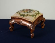 VICTORIAN CARVED WALNUT SQUARE FOOTSTOOL, with cream and floral wool work tapestry cover, moulded