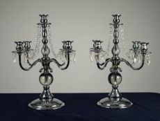 MODERN PAIR OF CHROME FOUR BRANCH, FIVE LIGHT CANDELABRAS, each of column form with scroll arms,