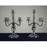 MODERN PAIR OF CHROME FOUR BRANCH, FIVE LIGHT CANDELABRAS, each of column form with scroll arms,