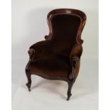 VICTORIAN CARVED MAHOGANY SPOON BACK EASY ARMCHAIR, the moulded show wood frame enclosing a