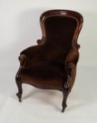 VICTORIAN CARVED MAHOGANY SPOON BACK EASY ARMCHAIR, the moulded show wood frame enclosing a