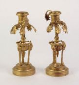 PAIR OF EMPIRE STYLE GILT METAL CANDLESTICKS, each with central column, issuing seven short arms