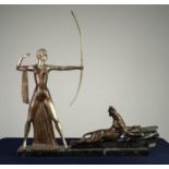 CONTINENTAL ART DECO SILVERED AND PATINATED BRONZE GROUP OF DIANA THE HUNTRESS, she modelled