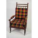 WILLIAM IV BOBBIN TURNED AND STAINED BEECH LIBRARY CHAIR, with elbow pads and loose cushions to