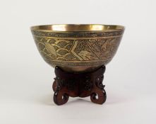 EARLY TWENTIETH CENTURY CHINESE ENGRAVED BRASS BOWL ON PIERCED HARDWOOD STAND, the bowl of steep