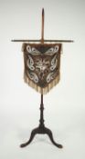 NINETEENTH CENTURY MAHOGANY POLE SCREEN, of typical form with tripod supports, later fitted to the