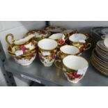 A ROYAL CHELSEA 'GOLDEN ROSE' PATTERN TEA SERVICE OF 39 PIECES