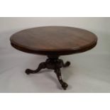 EARLY NINETEENTH CENTURY ROSEWOOD TILT TOP DINING TABLE, the moulded circular top above a heavy