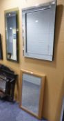 TWO OBLONG FRAMELESS WALL MIRRORS AND A GILT FRAMED WALL MIRROR (3)