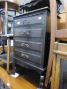 AN EDWARDIAN MAHOGANY FOUR DRAWER SHEET MUSIC CABINET WITH RAISED SUPERSTRUCTURE, ON SHORT CABINET