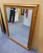 A LARGE OBLONG BEVELLED EDGE WALL MIRROR, IN PINE FRAME, 3?11? X 2?11? OVERALL