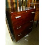 A MODERN OFFICE CHEST OF THREE LONG AND DEEP FILING DRAWERS EACH WITH TWO BRIGHT METAL HANDLES, 2?7?