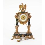 LATE NINETEENTH CENTURY BLACK VEINED MARBLE AND GILT METAL PORTICO TYPE FRENCH MANTLE CLOCK, the