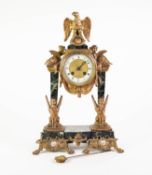 LATE NINETEENTH CENTURY BLACK VEINED MARBLE AND GILT METAL PORTICO TYPE FRENCH MANTLE CLOCK, the