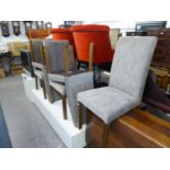 A SET OF SIX ALL-UPHOLSTERED HIGH BACK DINING CHAIRS, COVERED IN GREY WEAVE, ON STRAIGHT SQUARE
