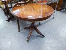 BEVEN AND FUNNEL REGENCY STYLE MAHOGANY CIRCULAR LOW OCCASIONAL TABLE, ON COLUMN AND SWEPT QUARTETTE