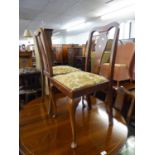 A SET OF FOUR MAHOGANY DINING CHAIRS WITH SPLAT BACKS AND A PAIR OF CHAIRS WITH SHELL CARVED TOP