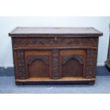 COMPOSITE SEVENTEENTH CENTURY AND LATER CARVED OAK AND STAINED PINE LARGE CHEST, the part hinged,