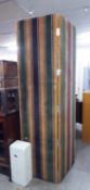 A TALL UPHOLSTERED BED HEADBOARD, COVERED IN STRIPED CUT VELVET, 5? WIDE, 6?9? HIGH
