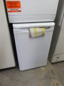 AN INDESIT THREE DRAWER FREEZER AND A CLOCKWORKS MICROWAVE (2)