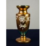ITALIAN, FLORAL PAINTED BLUE GLASS VASE, of ovoid, footed form with waisted neck, decorated with a