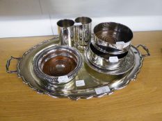 AN ELECTROPLATE TWO HANDLED TRAY, THREE PLATED WINE COASTERS, PLATED BOTTLE STAND AND TWO