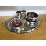 AN ELECTROPLATE TWO HANDLED TRAY, THREE PLATED WINE COASTERS, PLATED BOTTLE STAND AND TWO