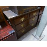 EDWARDIAN MAHOGANY CHEST OF TWO SHORT AND TWO LONG GRADUATED DRAWERS, THE BRASS DROP HANDLES