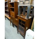 AN OAK DROP-LEAF OCCASIONAL TABLE, A MUSIC CABINET WITH GLASS PANEL DOOR AND A BEDSIDE CUPBOARD (3)